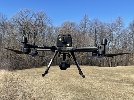 drone-1 drone in action over a field